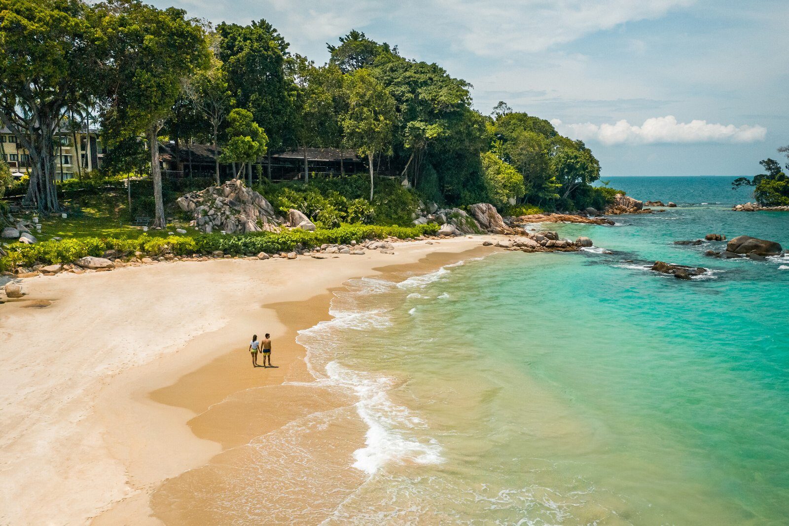 Fine sand beach and turquoise water at Club Med Bintan Island