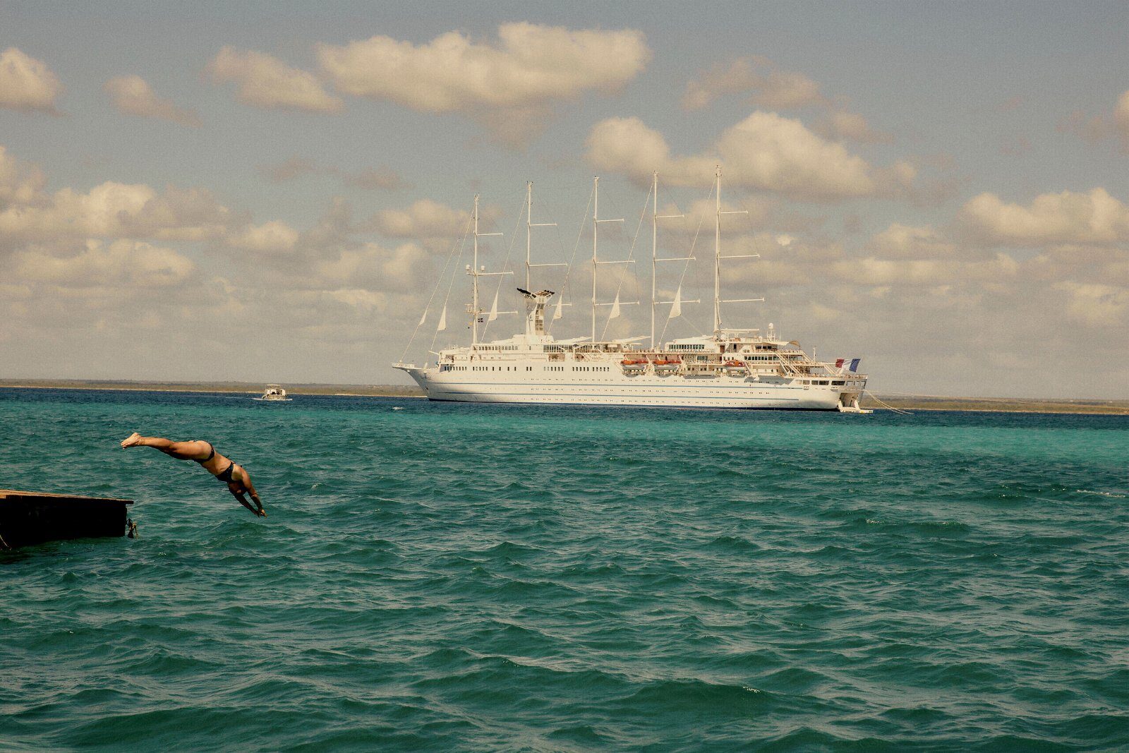 The Club Med 2 at anchor in a turquoise Caribbean sea