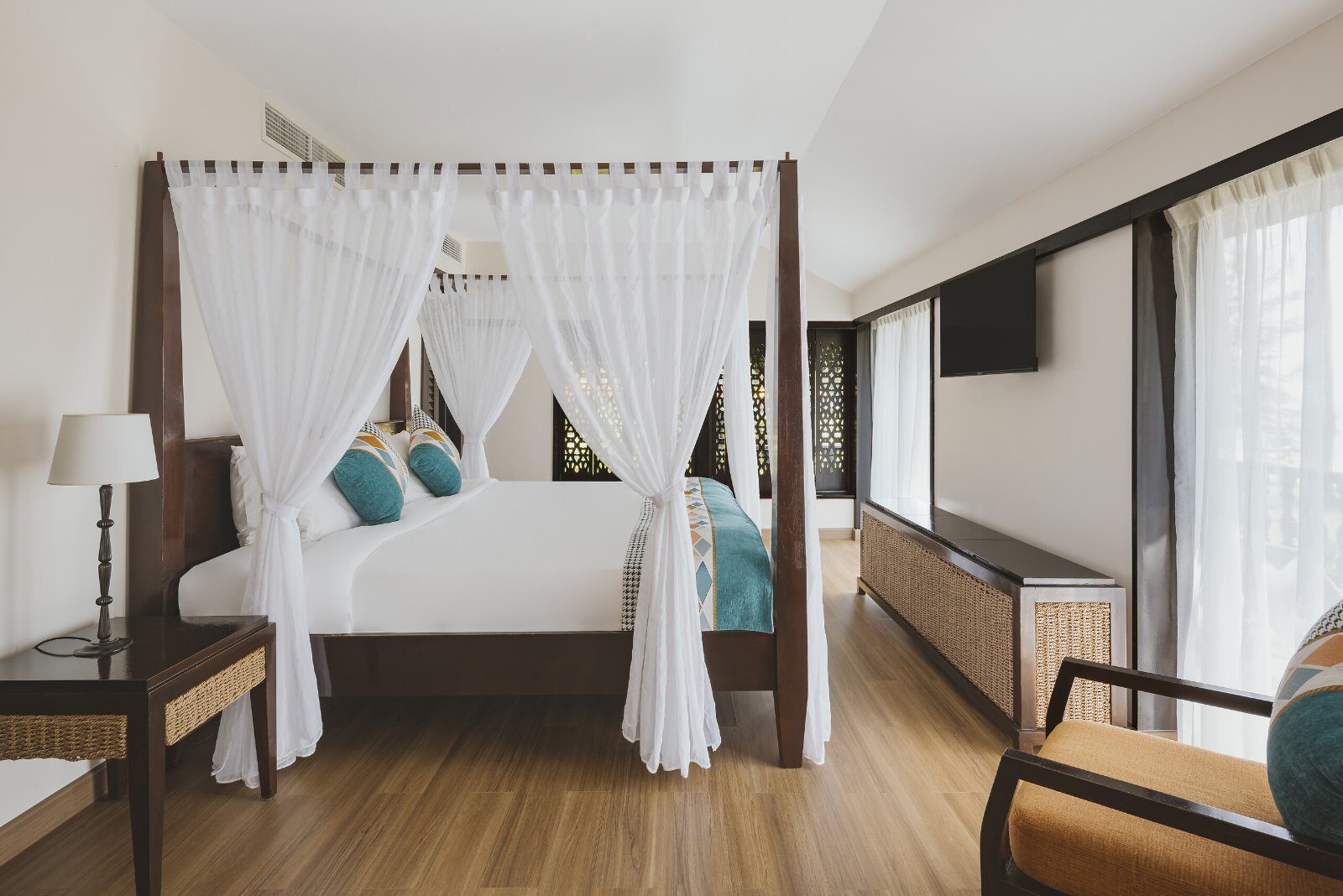 Wood-panelled room with Malaysian charm at Club Med Cherating Beach
