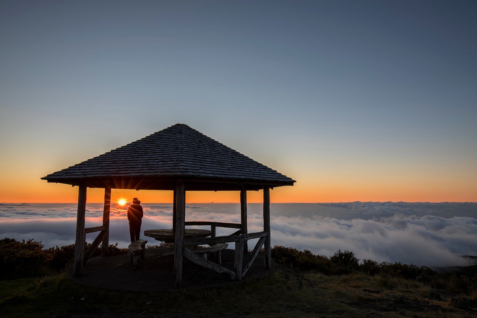 Gazebo above a sea of clouds at sunset, Reunion Island