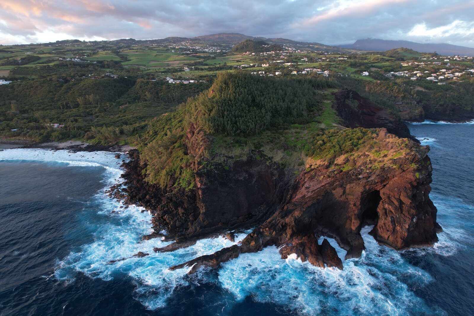 Volcanic coastline pounded by the ocean, Reunion Island