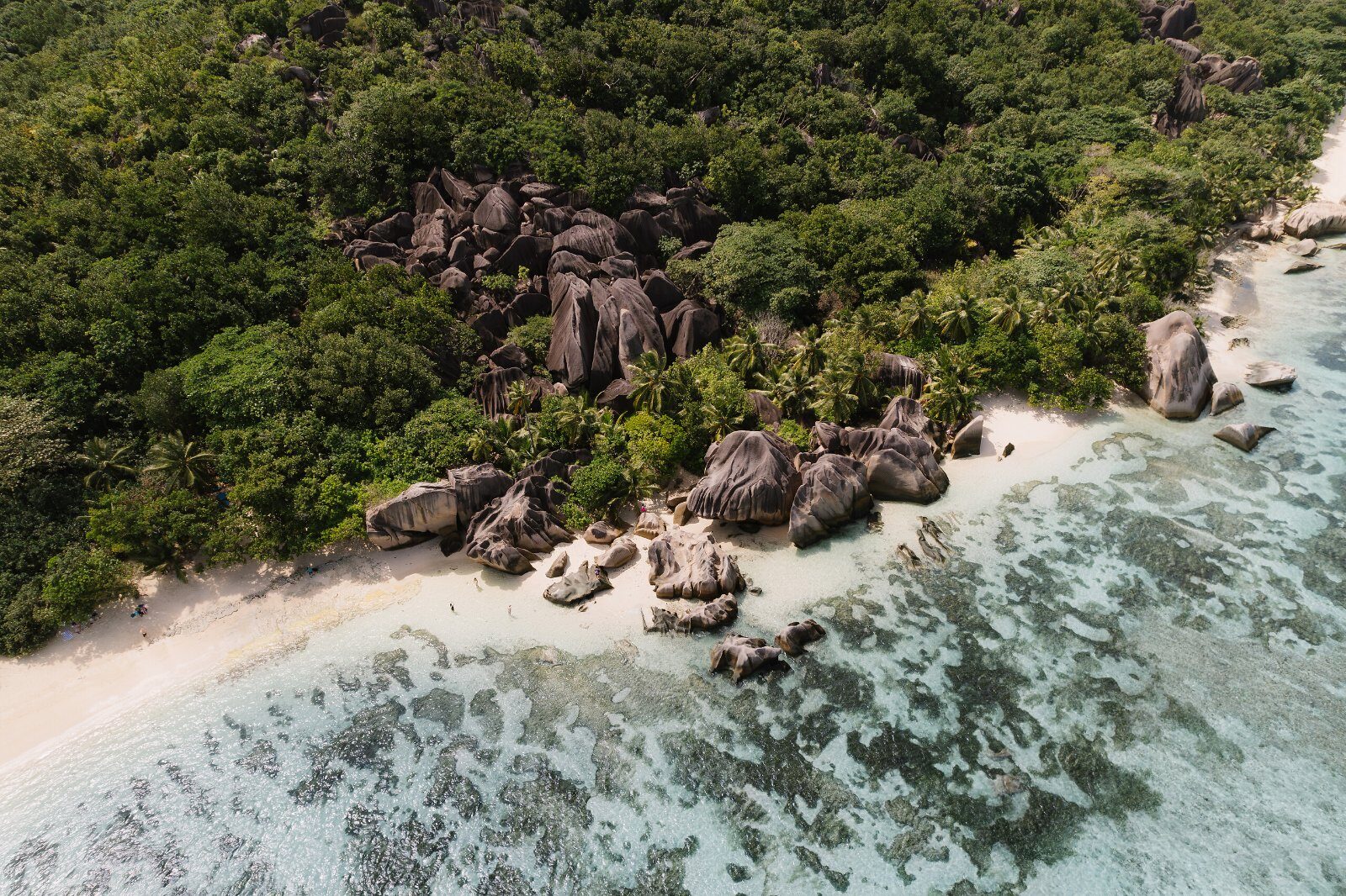 White sand beach and granite boulders on Praslin