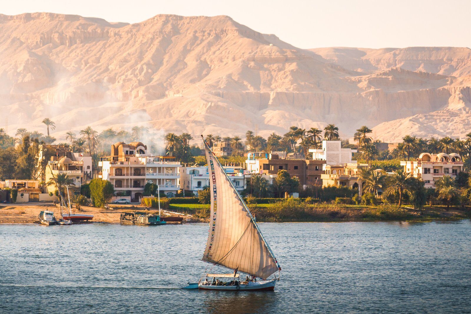 Felucca on the Nile at the foot of the hills
