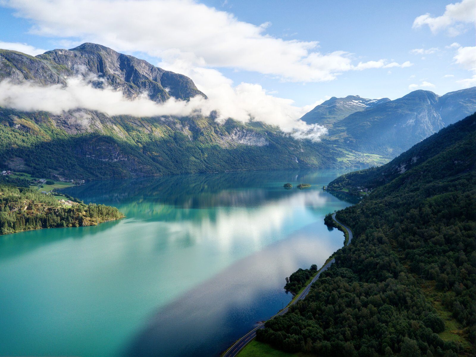 Fjord between the snowy mountains of Norway