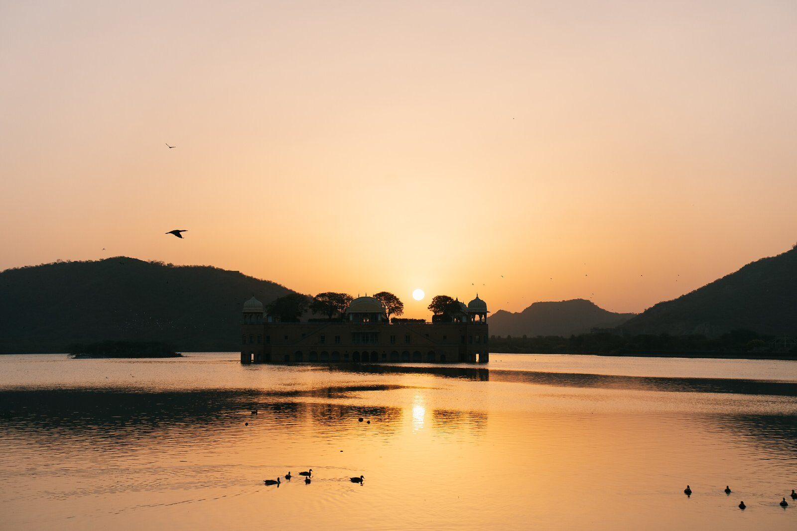 Sunrise over a lake in Rajasthan