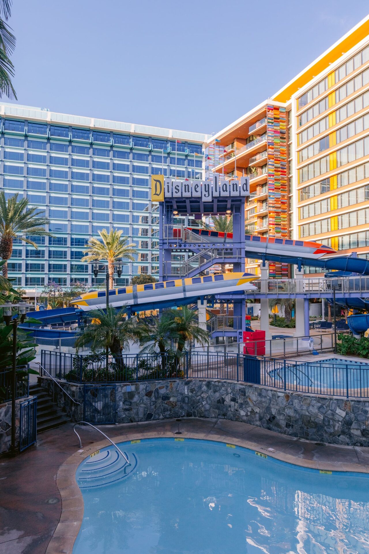 A view of the Disneyland Hotel from its gardens at the Disneyland Resort in California A view of the Disneyland Hotel from its gardens at the Disneyland Resort in California