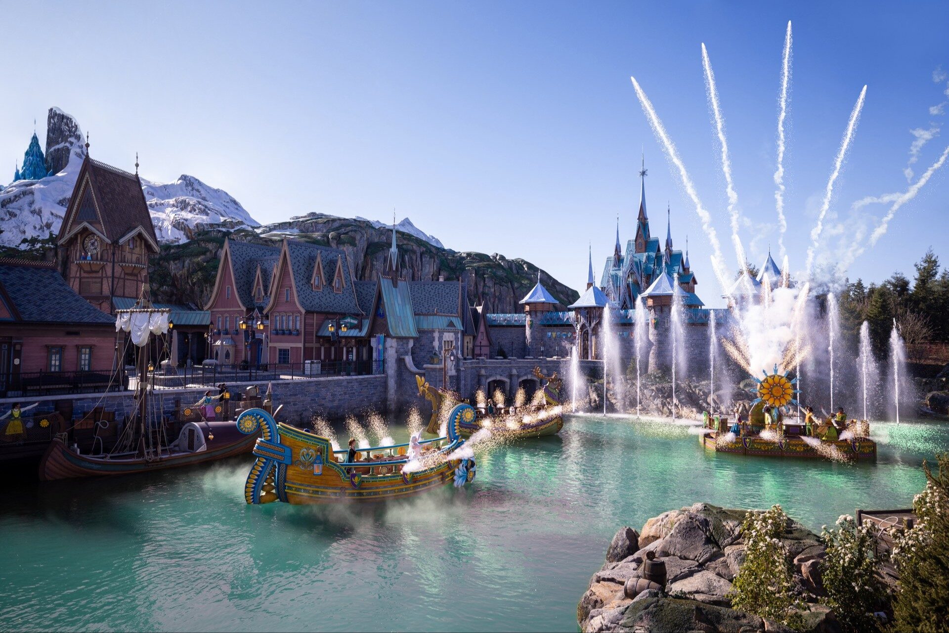 The boats of A Celebration in Arendelle glide across the lake, between the fountains and Arendelle Castle. Photo: ©Disney. The boats of A Celebration in Arendelle glide across the lake, between the fountains and Arendelle Castle. Photo: ©Disney.