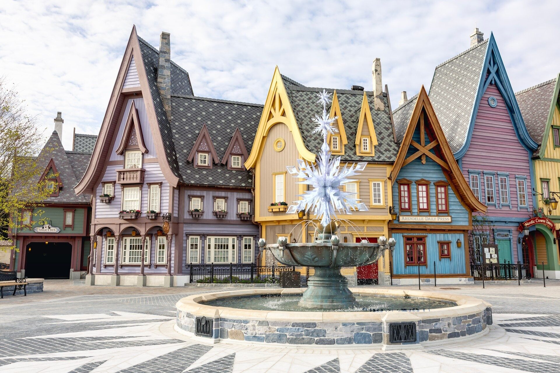 The square in the village of Arendelle at World of Frozen, with colourful peaked-roof houses and a snowflake fountain. Photo: ©Disney. The square in the village of Arendelle at World of Frozen, with colourful peaked-roof houses and a snowflake fountain. Photo: ©Disney.