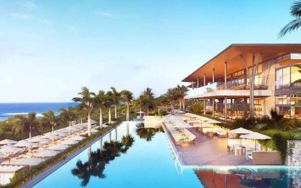 Le complexe Club Med en Afrique du Sud dévoile une vaste piscine à débordement, des terrasses bordées de palmiers et une architecture contemporaine ouverte sur l’océan. Le complexe Club Med en Afrique du Sud dévoile une vaste piscine à débordement, des terrasses bordées de palmiers et une architecture contemporaine ouverte sur l’océan.
