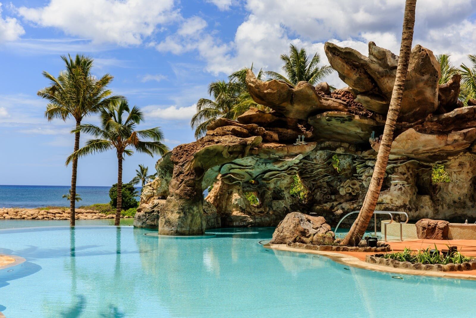 The Ka Maka Grotto infinity pool facing the ocean at Aulani The Ka Maka Grotto infinity pool facing the ocean at Aulani