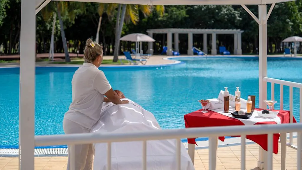 Massage next to the pool at Resonance Blu Varadero Cuba with Voyages Aqua Terra